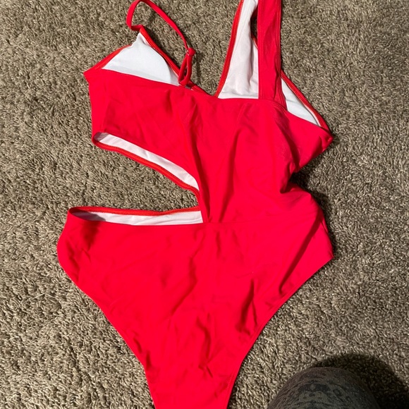 She in red cutout one piece - Picture 5 of 5
